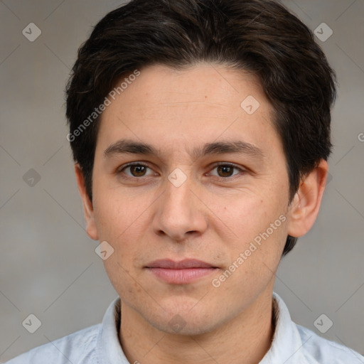 Joyful white adult male with short  brown hair and brown eyes