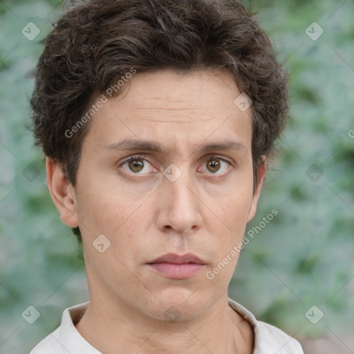 Neutral white adult male with short  brown hair and brown eyes