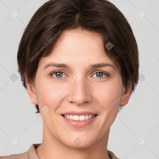 Joyful white young-adult female with short  brown hair and grey eyes