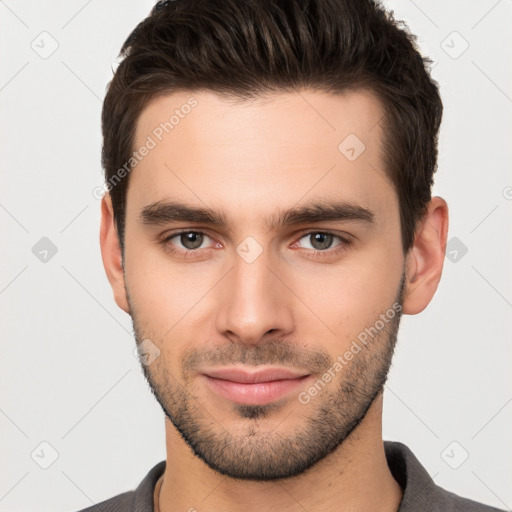 Neutral white young-adult male with short  brown hair and brown eyes