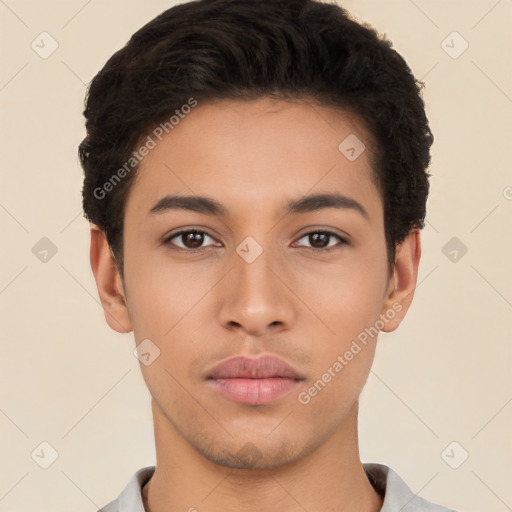 Neutral latino young-adult male with short  black hair and brown eyes