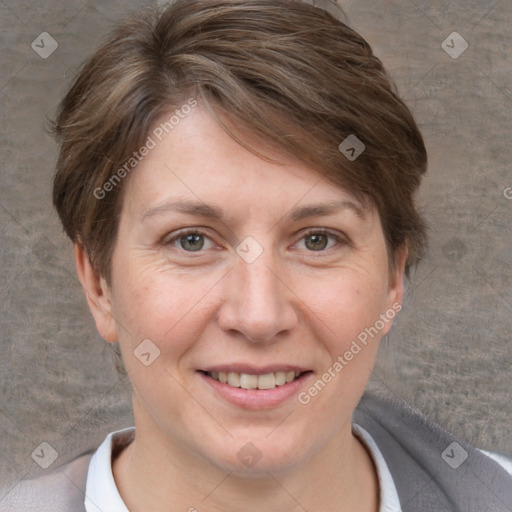 Joyful white adult female with short  brown hair and grey eyes