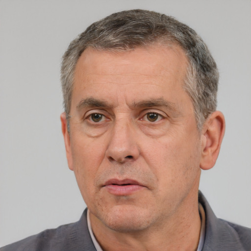 Neutral white middle-aged male with short  black hair and brown eyes