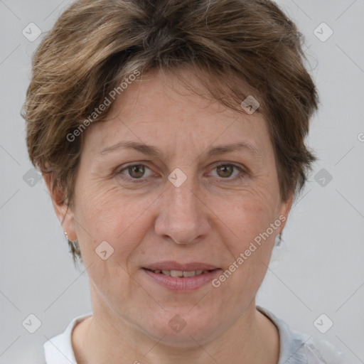 Joyful white adult female with short  brown hair and brown eyes