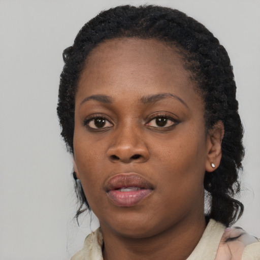 Neutral black young-adult female with long  black hair and brown eyes