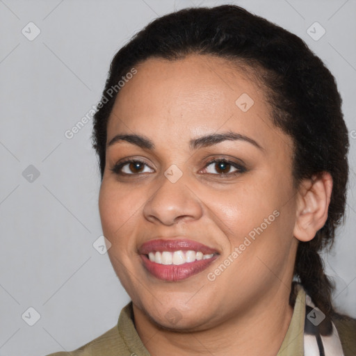 Joyful latino young-adult female with medium  black hair and brown eyes