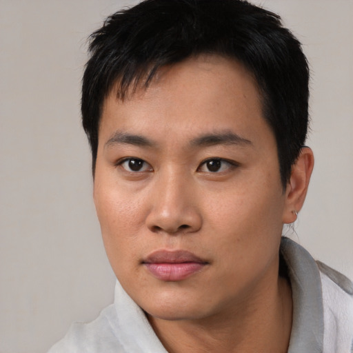Neutral asian young-adult male with short  black hair and brown eyes