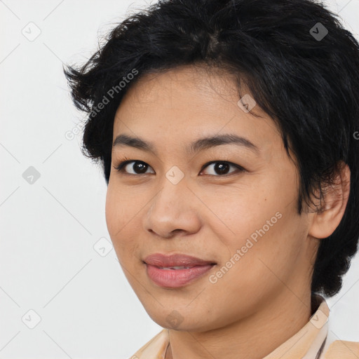 Joyful asian young-adult female with medium  black hair and brown eyes