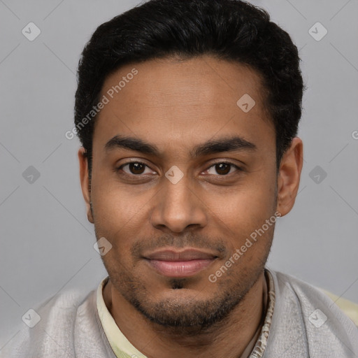 Joyful latino young-adult male with short  black hair and brown eyes