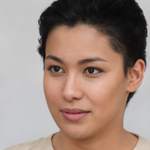 Joyful asian young-adult female with short  brown hair and brown eyes