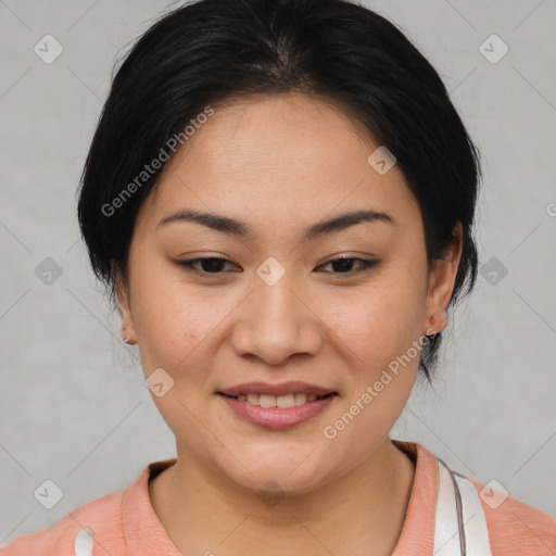 Joyful asian young-adult female with short  brown hair and brown eyes