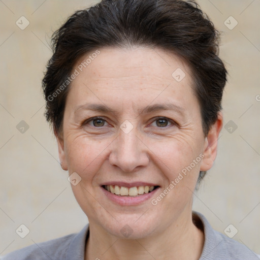 Joyful white adult female with short  brown hair and brown eyes