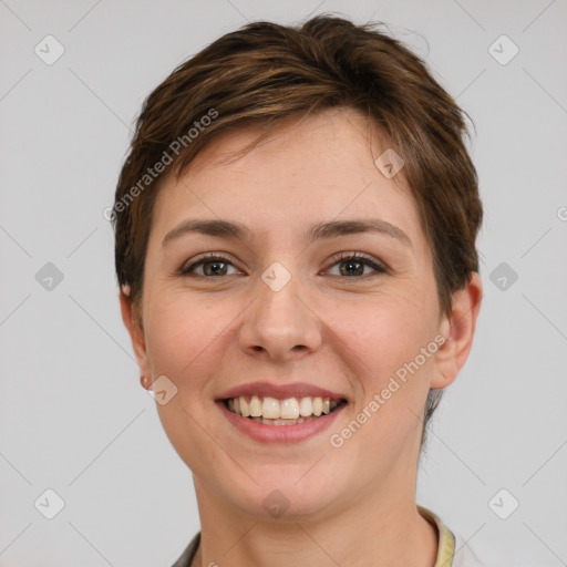 Joyful white young-adult female with short  brown hair and grey eyes