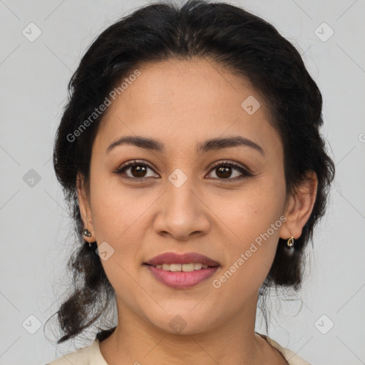 Joyful latino young-adult female with medium  brown hair and brown eyes