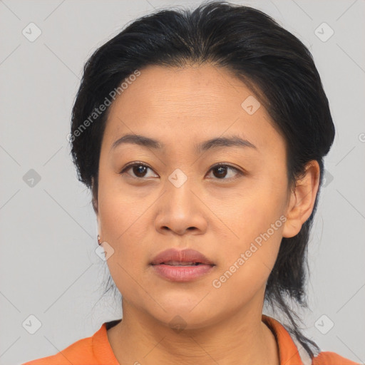 Joyful asian young-adult female with medium  brown hair and brown eyes