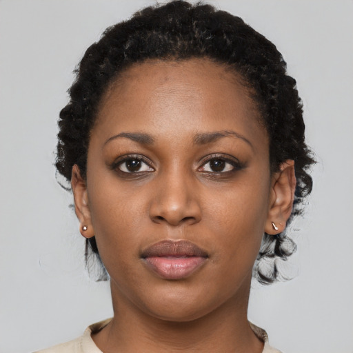 Neutral black young-adult female with short  brown hair and brown eyes