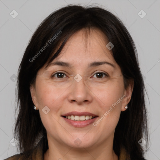 Joyful white adult female with medium  brown hair and brown eyes