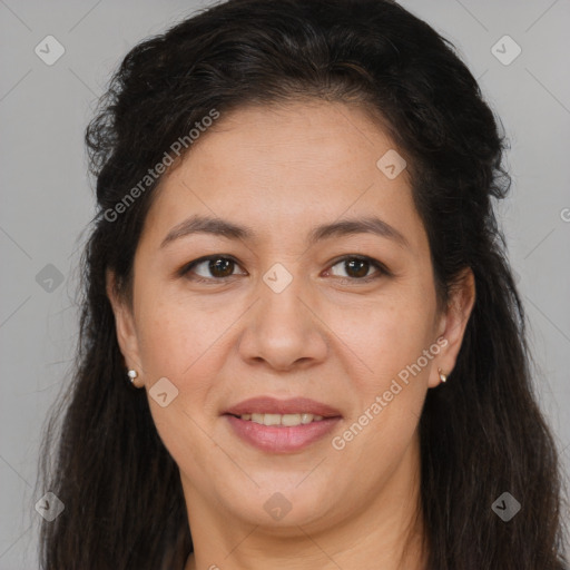 Joyful white adult female with long  brown hair and brown eyes