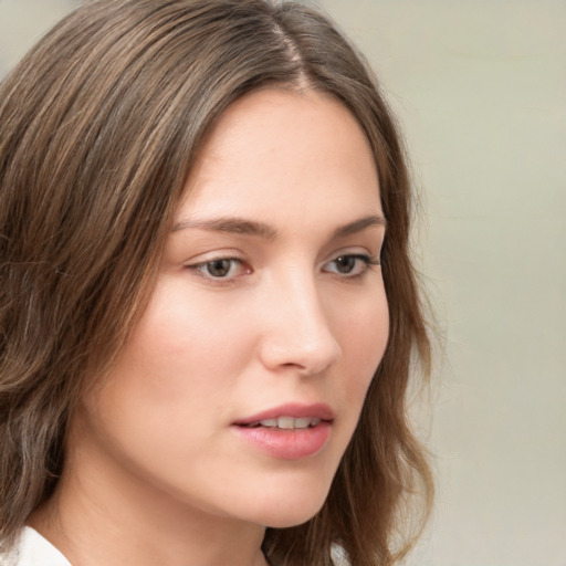 Neutral white young-adult female with medium  brown hair and grey eyes