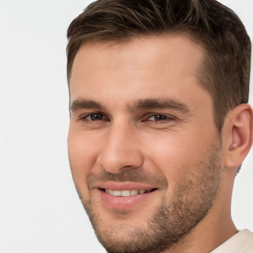 Joyful white young-adult male with short  brown hair and brown eyes