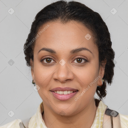 Joyful latino young-adult female with medium  brown hair and brown eyes