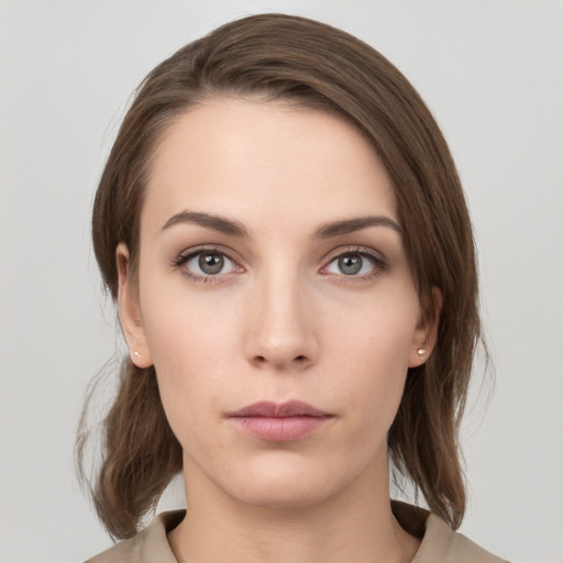 Neutral white young-adult female with medium  brown hair and grey eyes