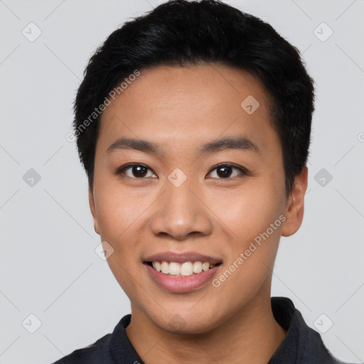 Joyful asian young-adult male with short  black hair and brown eyes