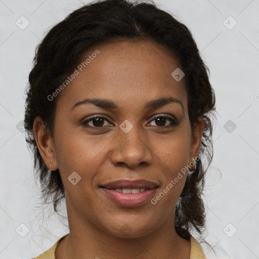 Joyful black young-adult female with medium  brown hair and brown eyes