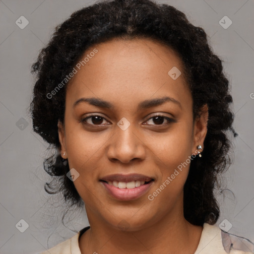 Joyful black young-adult female with long  brown hair and brown eyes