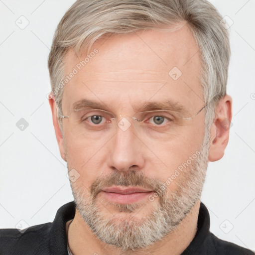 Neutral white adult male with short  brown hair and grey eyes