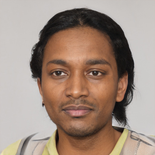 Neutral black young-adult male with short  black hair and brown eyes