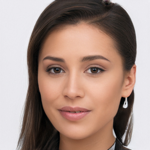 Joyful white young-adult female with long  brown hair and brown eyes