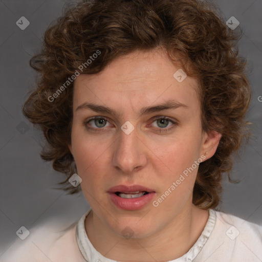 Joyful white young-adult female with medium  brown hair and blue eyes