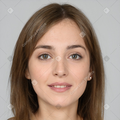 Joyful white young-adult female with long  brown hair and grey eyes