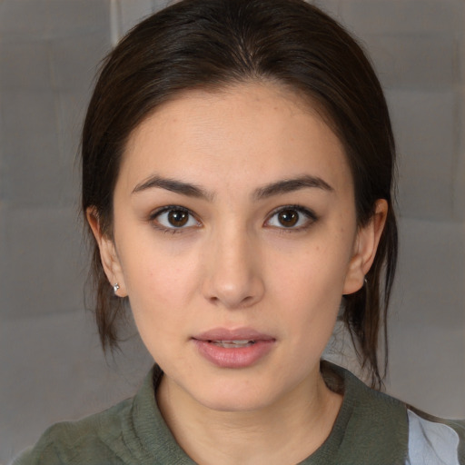 Neutral white young-adult female with medium  brown hair and brown eyes