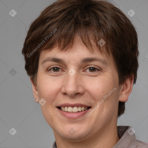 Joyful white adult female with medium  brown hair and brown eyes