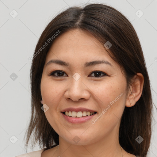 Joyful white young-adult female with medium  brown hair and brown eyes