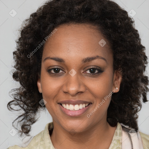 Joyful black young-adult female with medium  brown hair and brown eyes