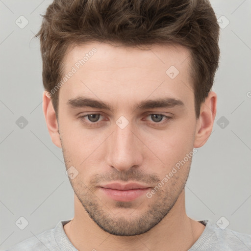 Neutral white young-adult male with short  brown hair and grey eyes