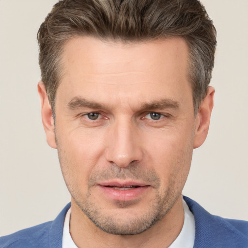 Neutral white adult male with short  brown hair and brown eyes