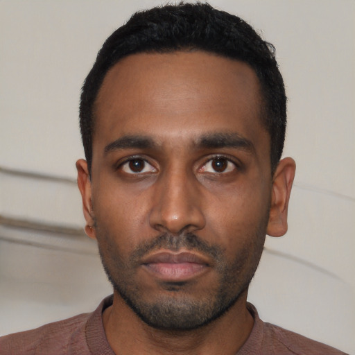 Neutral black young-adult male with short  black hair and brown eyes
