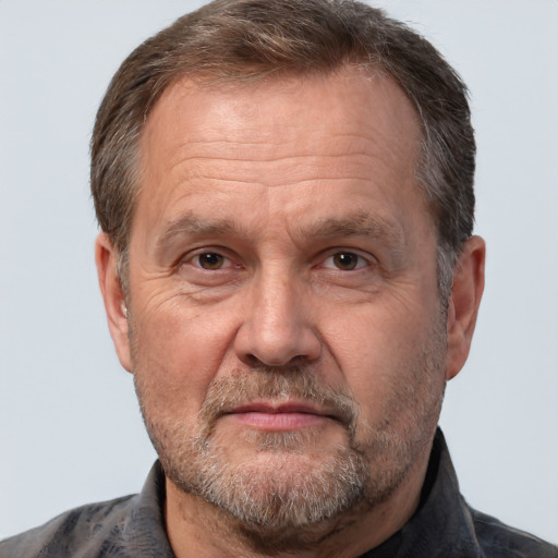 Joyful white middle-aged male with short  brown hair and brown eyes