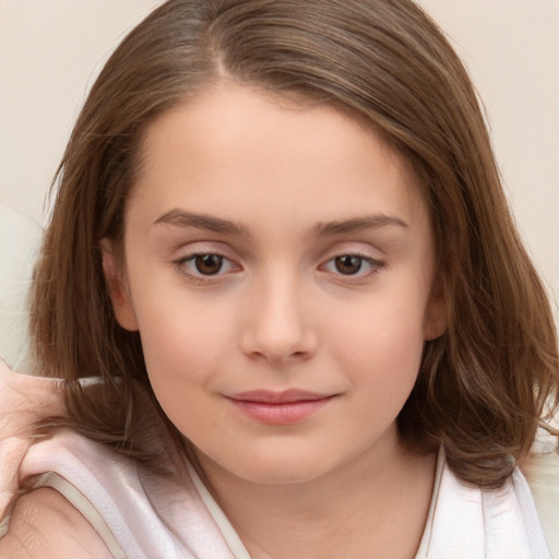 Joyful white child female with long  brown hair and brown eyes