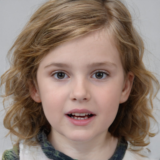 Joyful white child female with medium  brown hair and brown eyes