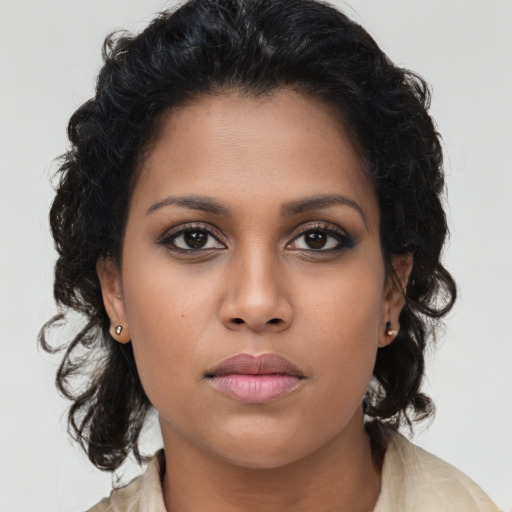 Neutral latino young-adult female with long  brown hair and brown eyes