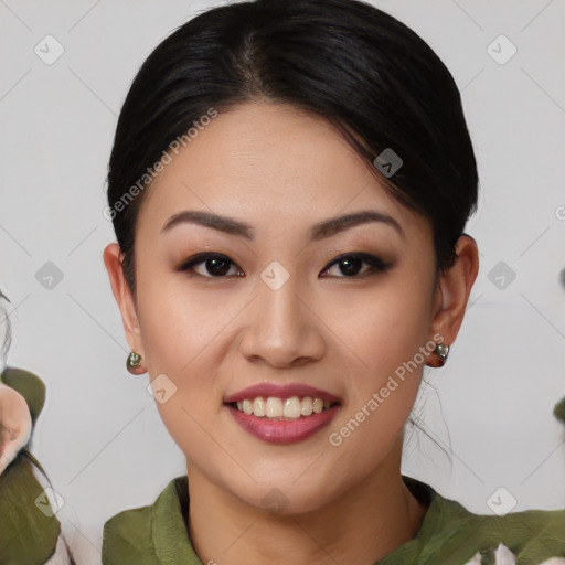 Joyful asian young-adult female with medium  black hair and brown eyes