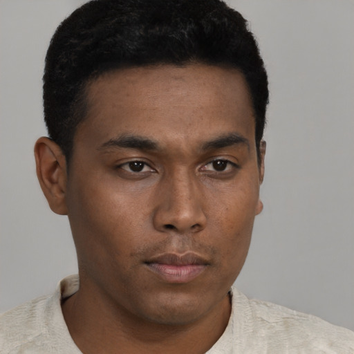 Neutral black young-adult male with short  black hair and brown eyes