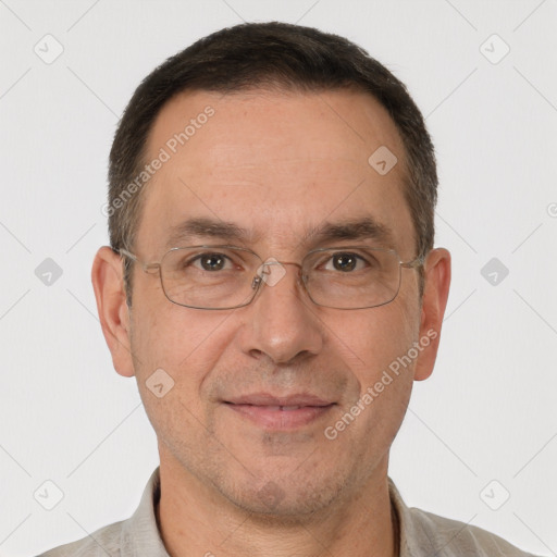 Joyful white adult male with short  brown hair and brown eyes