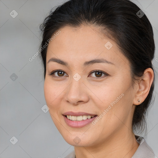 Joyful white young-adult female with medium  brown hair and brown eyes