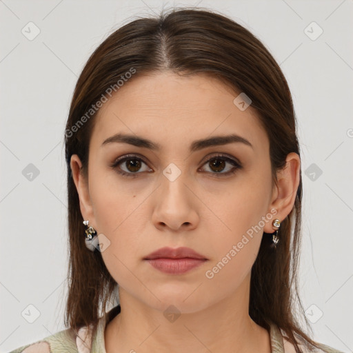 Neutral white young-adult female with medium  brown hair and brown eyes